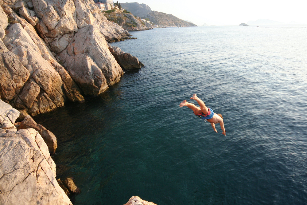 cliff diving naked